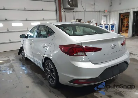 2019 Hyundai Elantra Limited z USA, uszkodzony, nr VIN 5NPD84LFXKH474318